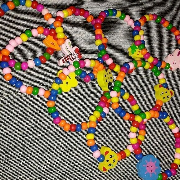 9 wooden beaded children's bracelets - Picture 2 of 7